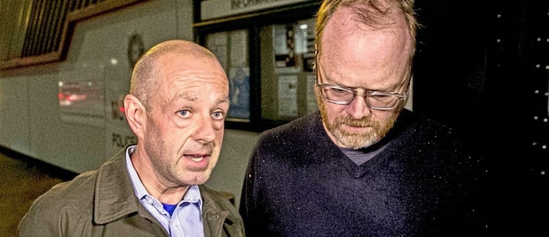 Journalist and film maker Barry McCaffrey (left) and Trevor Birney (right) outside Musgrave Street police station in Belfast following their arrest earlier this year. 