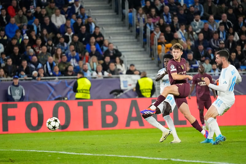 James McAtee scores his first goal for City (Petr David Josek/AP)