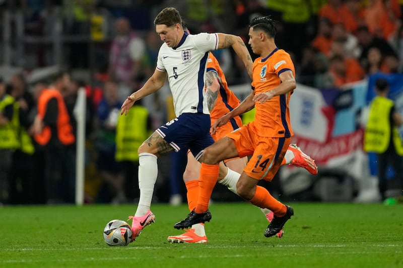 England defender John Stones produced a strong performance against the Netherlands (Darko Vojinovic/AP)