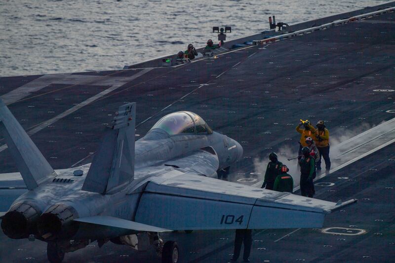 An F/A-18 Super Hornet prepares to launch from the flight deck of the aircraft carrier USS Theodore Roosevelt in the South China Sea on July 5 (Seaman Aaron Haro Gonzalez/US Navy/AP)