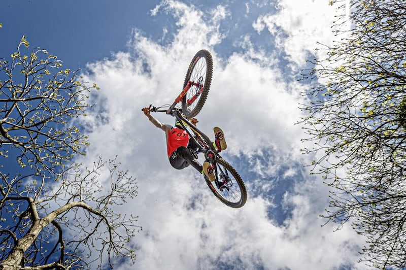 A proper mountain biker shows Geoff how it should be done at the Gap mountain bike centre. 