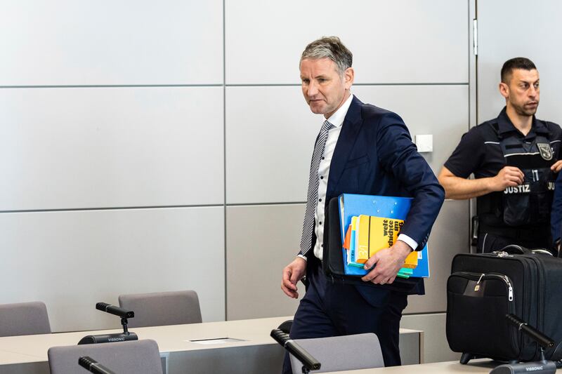 Bjorn Hocke arrives for a session of his trial in court in Halle, eastern Germany (Jens Schlueter/Pool Photo via AP)