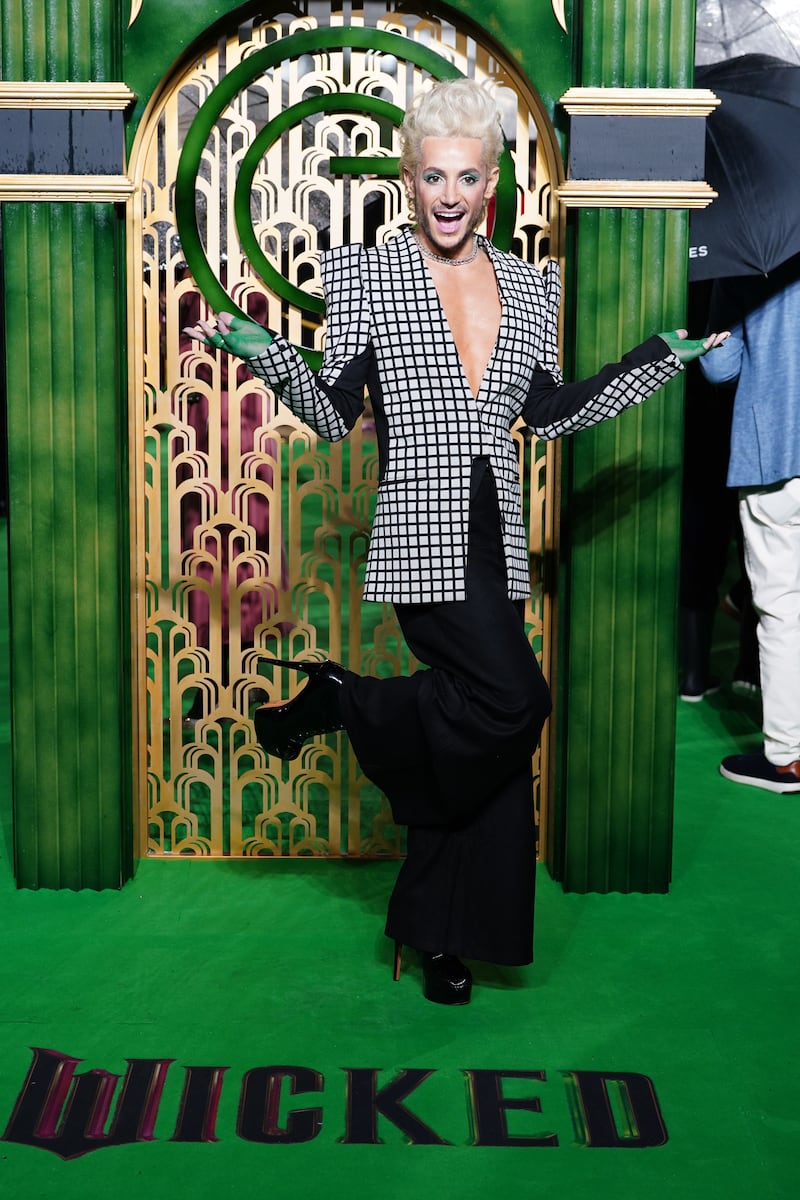 Frankie Grande accented his monochromatic look with emerald green details