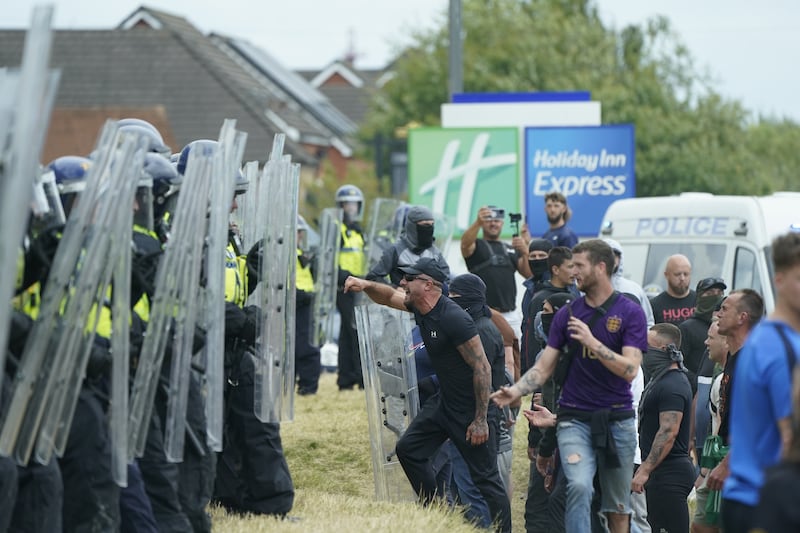 An anti-immigration demonstration outside the Holiday Inn Express in Rotherham