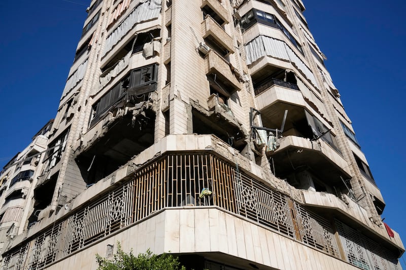 A destroyed apartment building hit by an Israeli airstrike, in central Beirut on Thursday (Hussein Malla/AP)