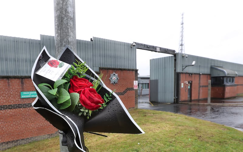Floral tributes left outside Maydown PSNI base in Derry where motorcyclist Richard Edwards was involved in a traffic collision with a police car close to the main gates on Wednesday. Mr Edwards who lived locally died later in hospital. Picture Margaret McLaughlin 21-6-2024