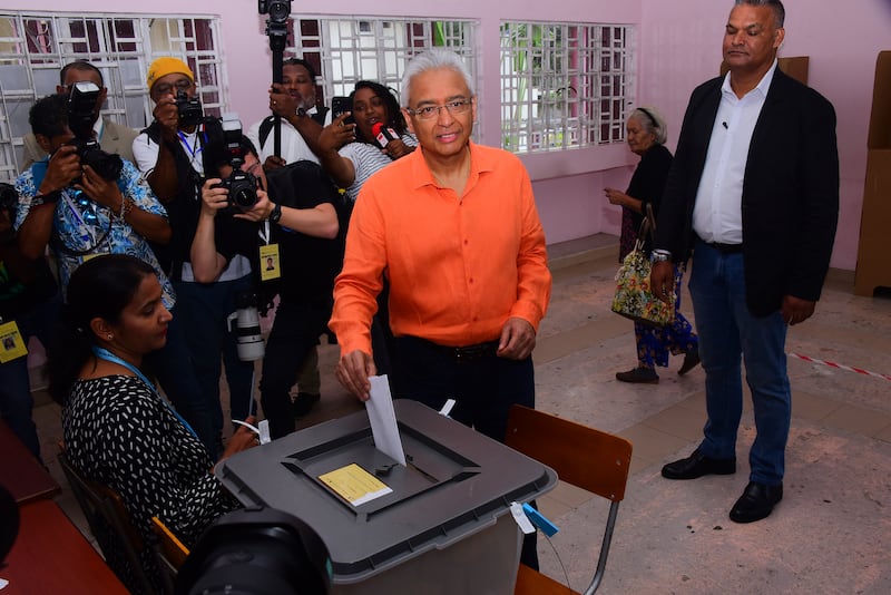 Prime Minister Pravind Jagnauth casts his vote at a polling station in the capital Port Louis (La Sentinelle/AP)