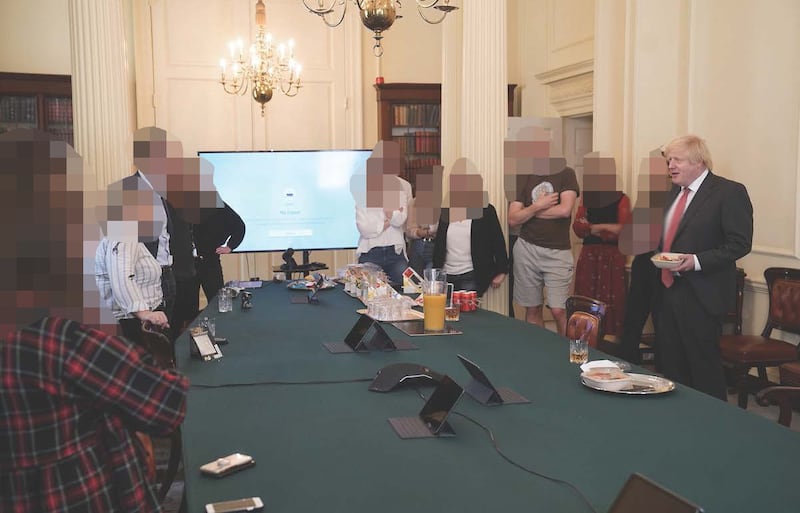 Then prime minister Boris Johnson at a gathering celebrating his birthday in the Cabinet Room at 10 Downing Street while Covid restrictions were in force