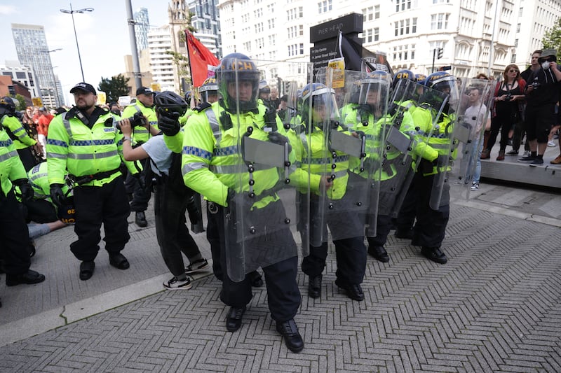 Riot police were deployed on the streets of Liverpool