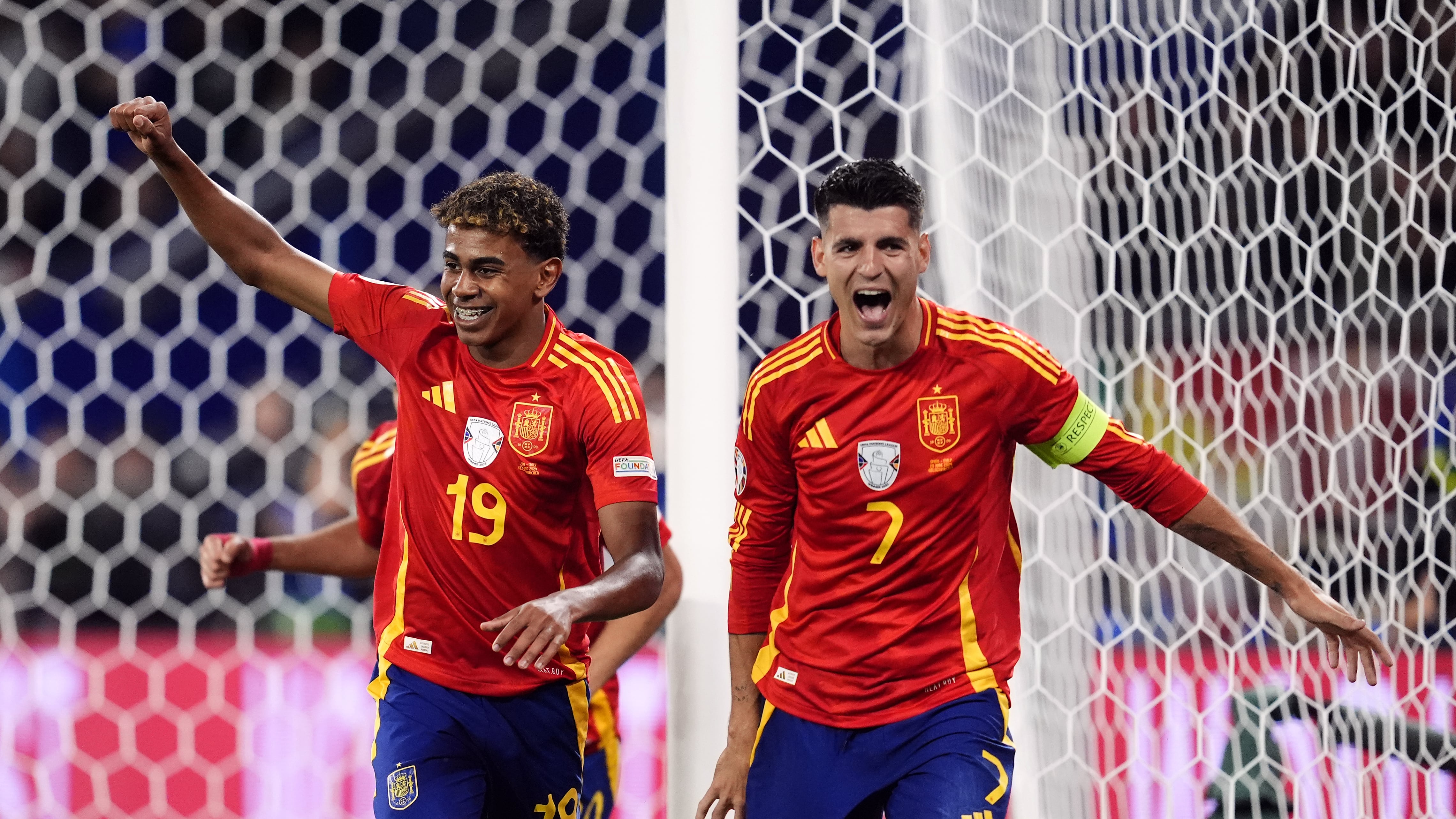 Spain’s Alvaro Morata and Lamine Yamal (left) celebrate after Italy’s Riccardo Calafiori’s own goal