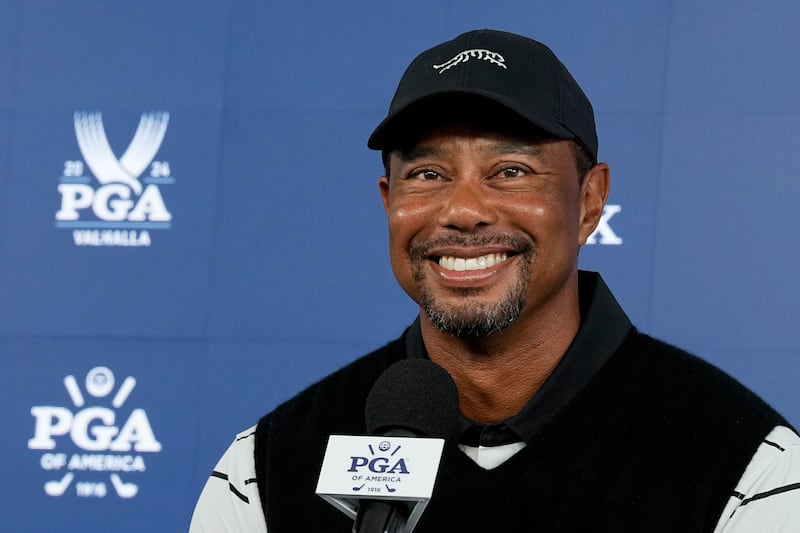 Tiger Woods (pictured) beat Bob May in a play-off at the PGA Championship in 2000 (Sue Ogrocki/AP)