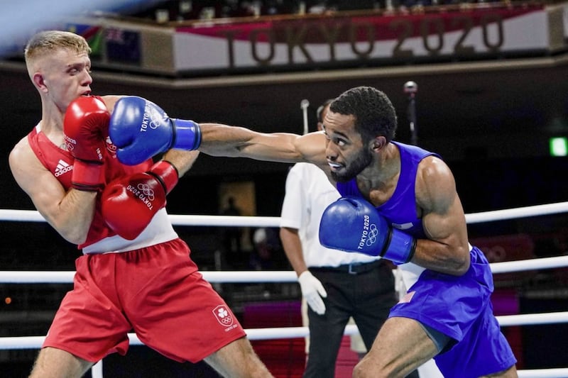 Duke Ragan, of the United States, right, punches Ireland's Kurt Walker during their men's featherweight 57-kg boxing match at the Tokyo 2020 Olympics, on Sunday&nbsp; &nbsp; &nbsp; &nbsp; &nbsp; &nbsp; &nbsp; &nbsp;Picture: AP Photo/Themba Hadebe