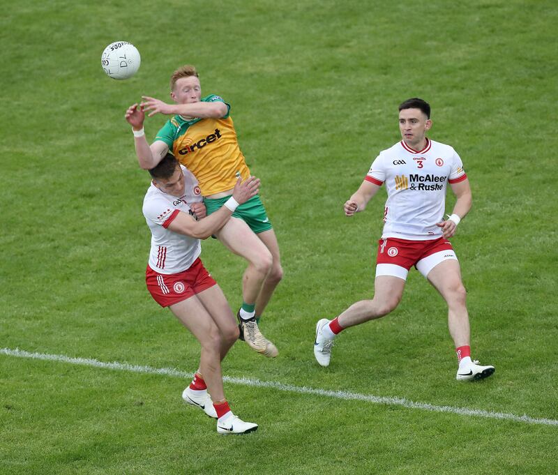 Donegal Oisin Gallen with Conn Kilpatrick and Padraig Hampsey of Tyrone during the All Ireland Senior Football Championship match played at Ballybofey on Saturday 25th May 2024.  Picture Margaret McLaughlin