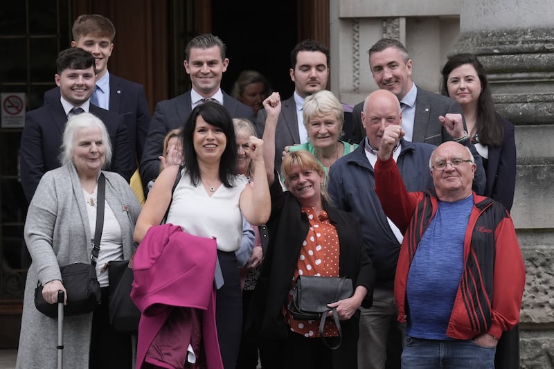 Families, supporters and solicitors involved in the appeal against the Legacy Act celebrate after Friday’s judgment