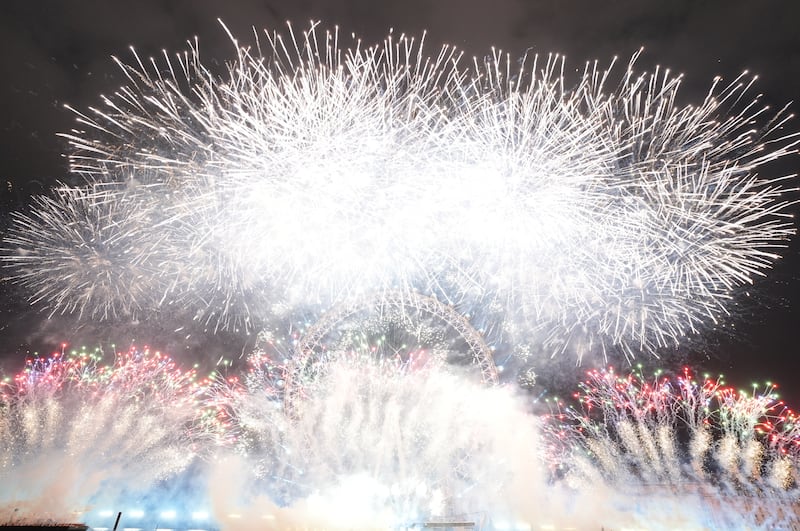 Fireworks light up the sky over the London Eye