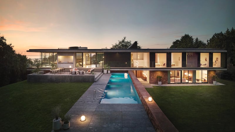 The 4,750 square foot prize property, which was nominated for the RIBA Mansell house of the year, features five bedrooms, a cinema room and a heated swimming pool