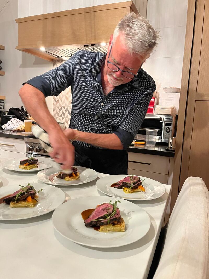 Chef David Friesen prepares a gourmet dinner at the cottage