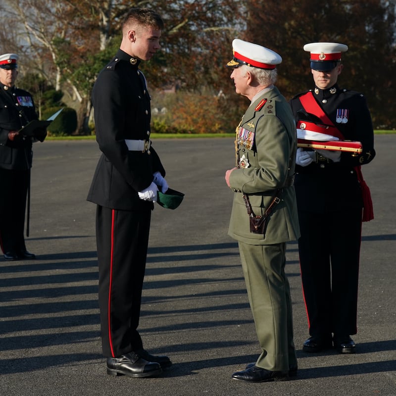 The King awards Marine Joseph Ryan the Commando Medal