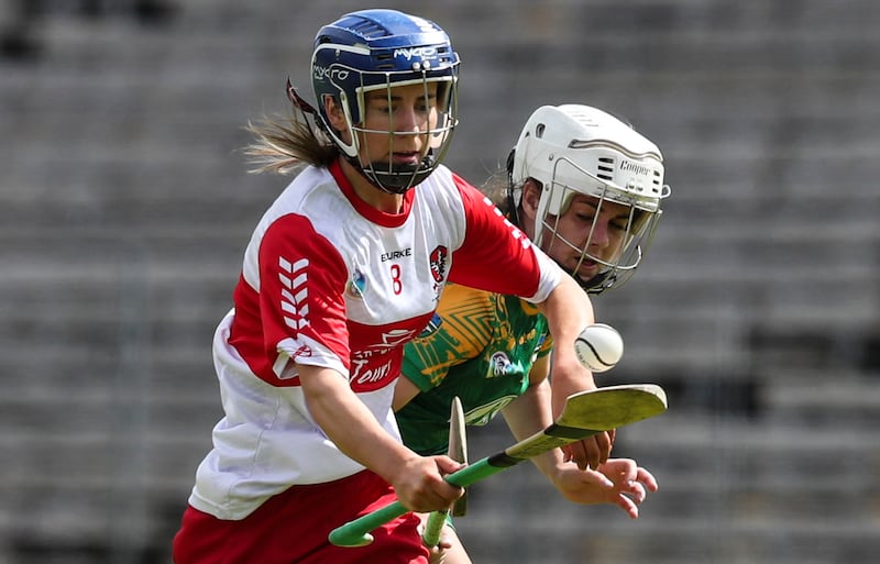 Dervla O'Kane soloing past a Meath opponent