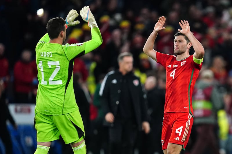 Danny Ward (left) celebrates Wales’ Euro 2024 qualifying victory over Croatia in October with teammate Ben Davies but has not played for his club Leicester this season