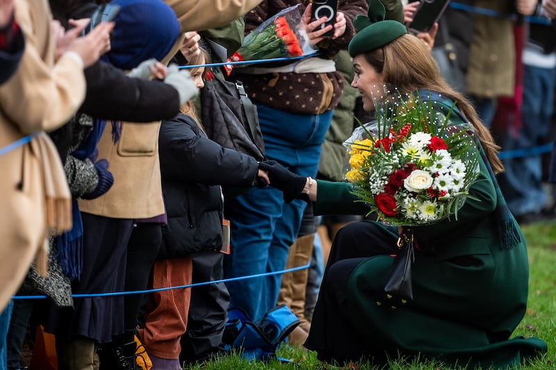 Kate speaks to a young well-wisher at Sandringham