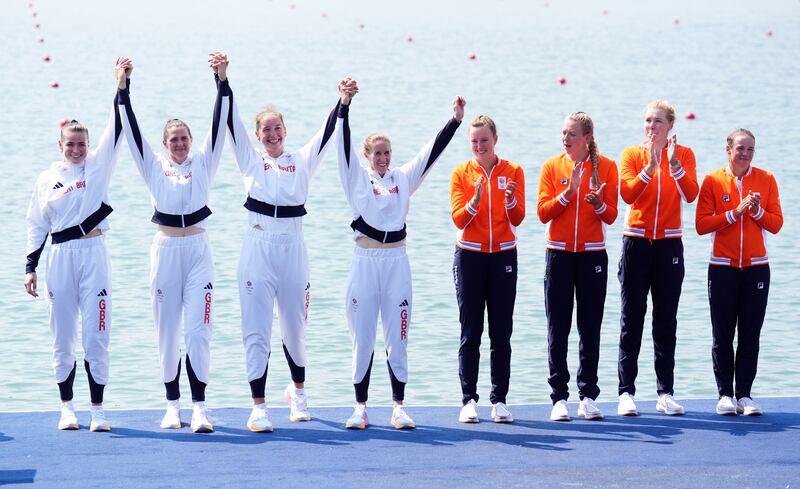 Great Britain's Helen Glover, Esme Booth, Sam Redgrave and Rebecca Shorten receive their silver medals during the ceremony for the Women's Rowing Four at the Vaires-sur-Marne Nautical Stadium on the sixth day of the 2024 Paris Olympic Games in France. Picture date: Thursday August 1, 2024. PA Photo. Photo credit: John Walton/PA Wire.