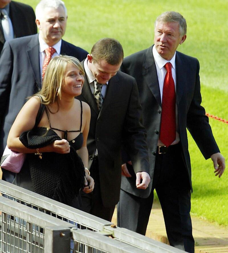 Wayne Rooney with girlfriend Coleen and Manchester United’s manager Sir Alex Ferguson in 2004