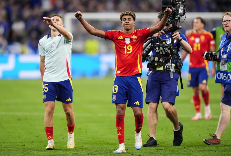 Lamine Yamal (centre) celebrates Spain’s victory over France after becoming the youngest scorer in European Championship history