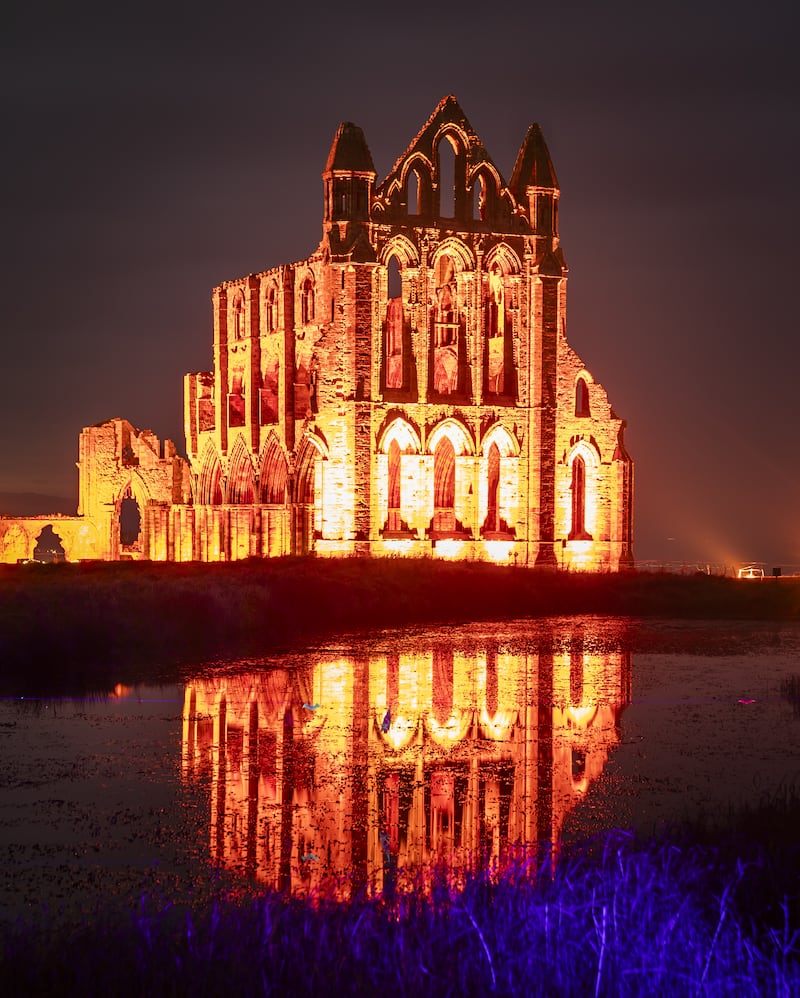 Lights illuminate the ruins of Whitby Abbey in North Yorkshire to mark Halloween