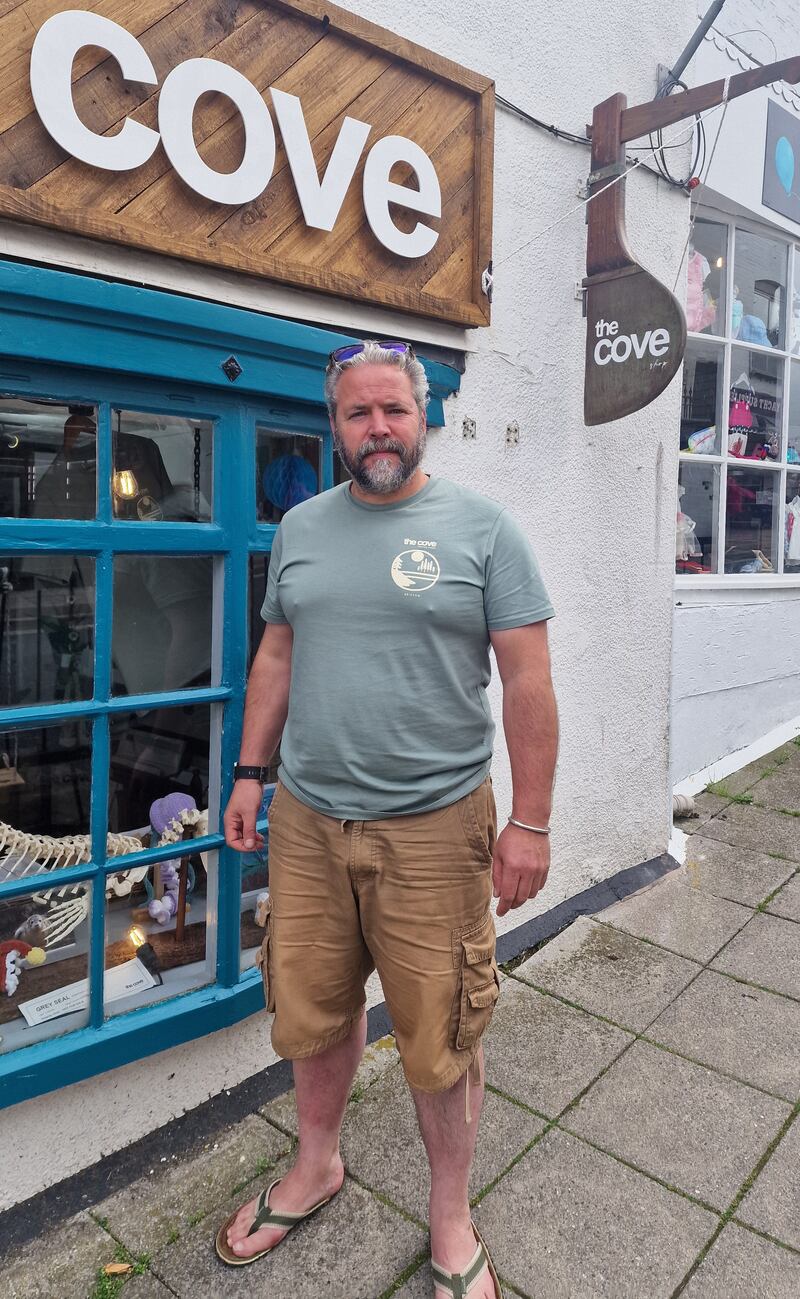 Duncan Kenny outside his shop in Brixham Harbour