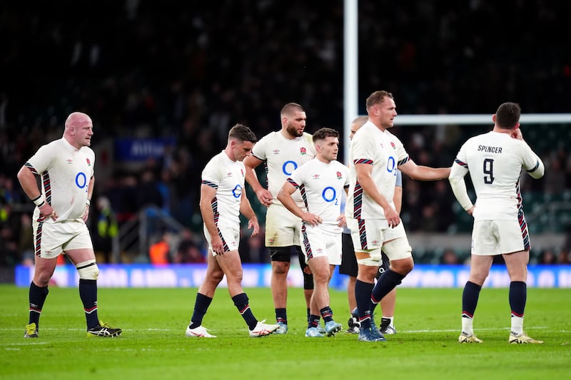 England players leave the field looking dejected