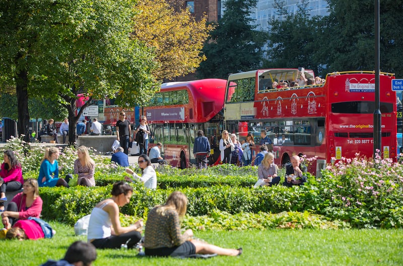 Office workers enjoy a lunch break in London