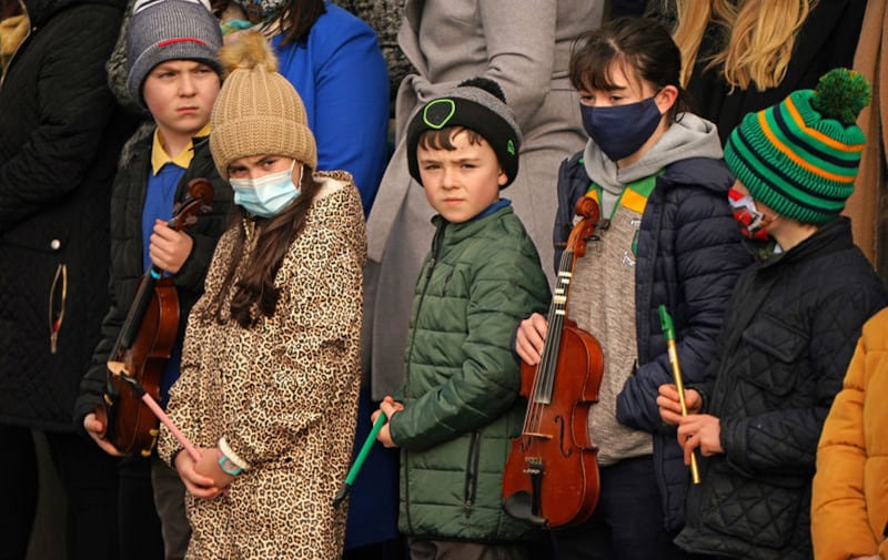 Young musicians form a guard of honour outside St Brigid's Church, Mountbolus, Co Offaly, for the funeral of Ashling Murphy. Picture by Niall Carson/PA Wire&nbsp;