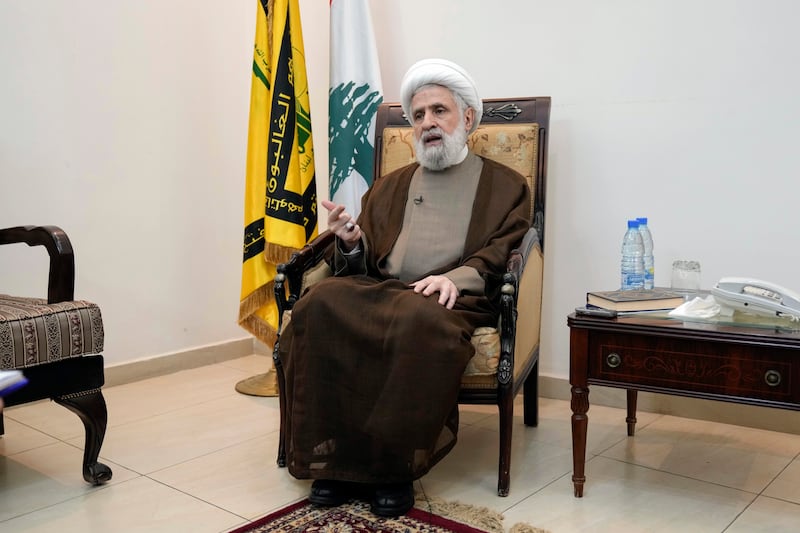 Hezbollah’s deputy leader Sheik Naim Kassem speaks during an interview with The Associated Press in Beirut’s southern suburbs, Lebanon, on Tuesday (Bilal Hussein/AP)