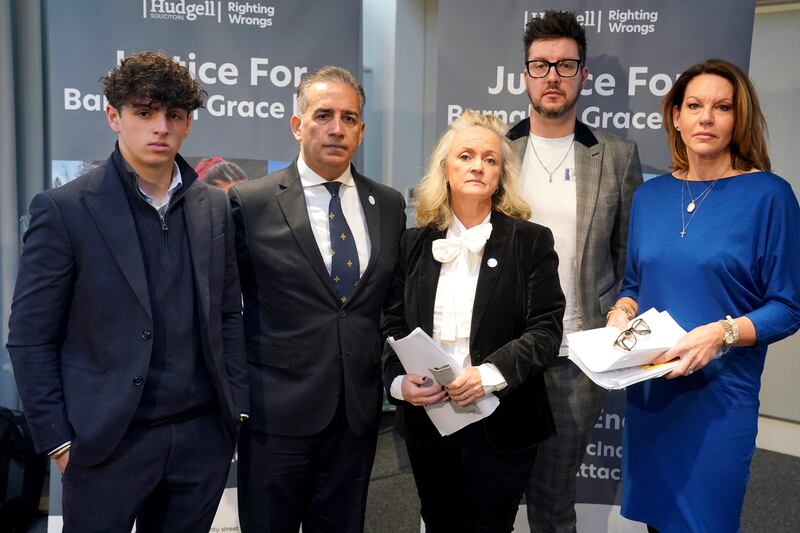 Grace O’Malley Kumar’s brother James, left to right, Dr Sanjoy Kumar, Dr Sinead O’Malley-Kumar, James Coates, the son of Ian Coates, and Emma Webber all attended the press conference