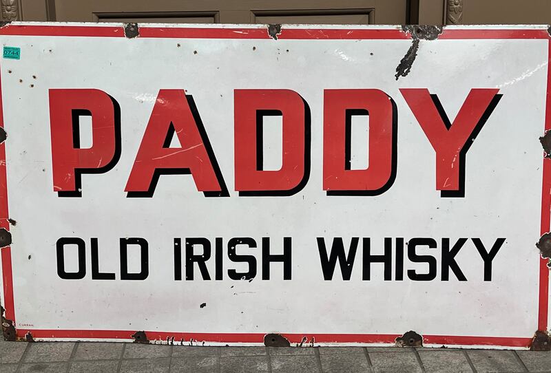 An original enamel Paddy Old Irish Whisky sign, predating Paddy’s change to the Irish spelling of whiskey (Niall Mullen)