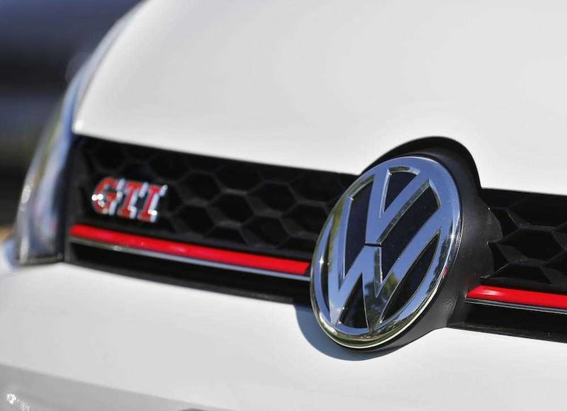 A Volkswagen car decorated with the iconic company symbol at a VW dealership. Picture by AP/Brennan Linsley