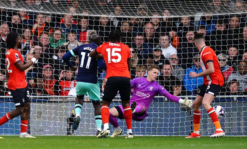 Yoane Wissa, centre left, scores his and Brentford’s second goal against Luton