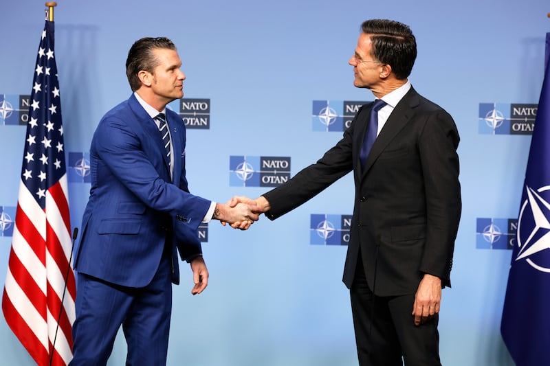 Nato secretary general Mark Rutte, right, met US secretary of defence Pete Hegseth at Nato headquarters in Brussels on Thursday (Geert Vanden Wijngaert/AP)