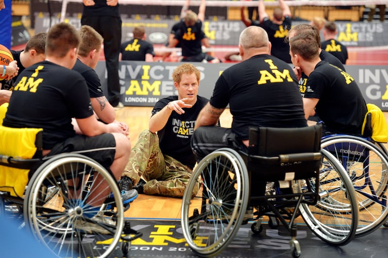 Harry, 29, with the wheelchair basketball teams in Queen Elizabeth Park when he announced his new Invictus Games in 2014