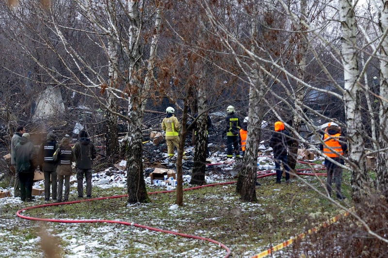 The plane came down about a mile short of the runway, authorities said (AP)