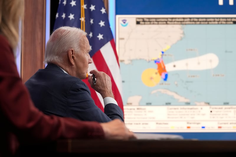 US President Joe Biden listens to a briefing about preparations for Hurricane Milton (Mark Schiefelbein/AP)