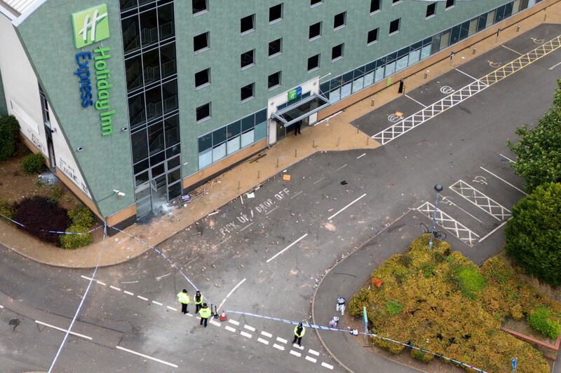 A drone view of police at the scene the day after the attack