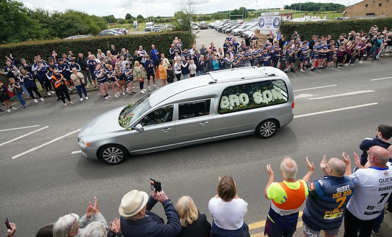 Rob Burrow’s funeral cortege passed through Featherstone town centre, West Yorkshire