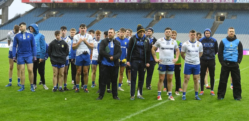 Dejected Ballinderry players and management on the field after the All Ireland Club Intermediate championship Final  at Croke Park, Dublin.