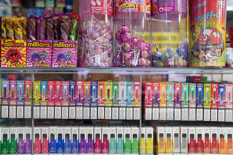 Disposable vapes of varying flavours on sale in a store