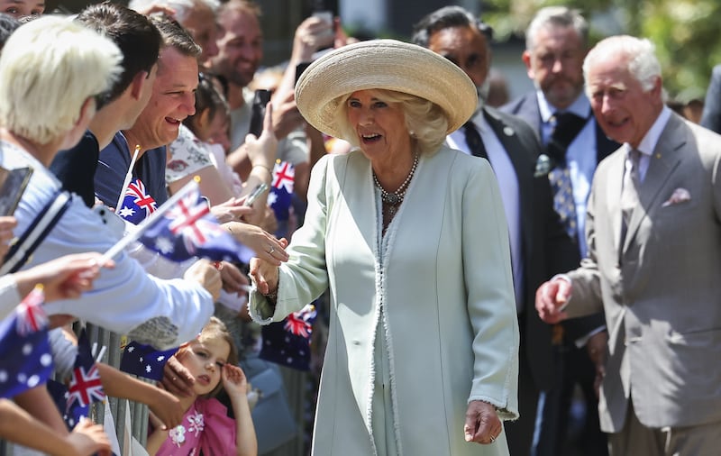 Queen Camilla speaks to wellwishers outside the church