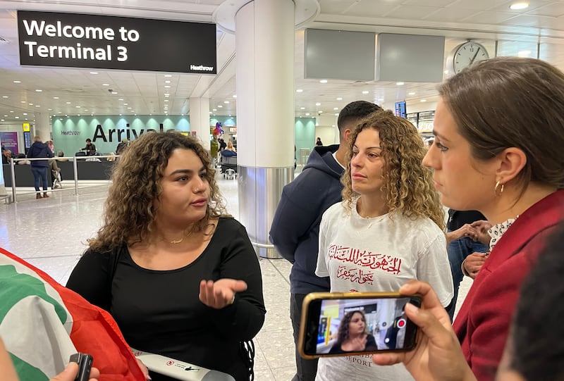 Lara (no surname given) speaks to media at Heathrow Airport after arriving on a flight from Beirut, Lebanon