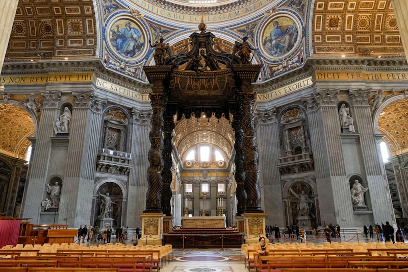 A view of the 17th century, 95ft-tall bronze canopy by Giovan Lorenzo Bernini (AP)