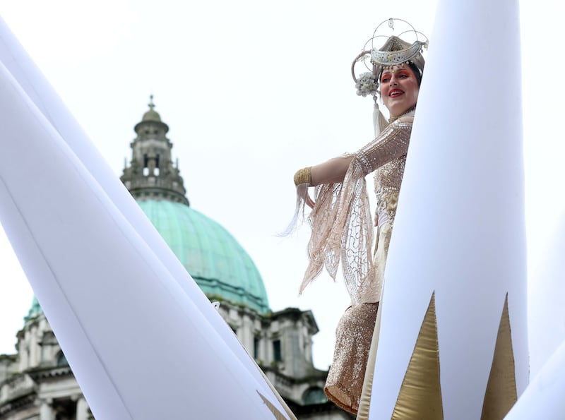 Performers entertain the crowd as  Thousands line the streets for the St Patrick’s day Parade in Belfast on Sunday.
PICTURE COLM LENAGHAN